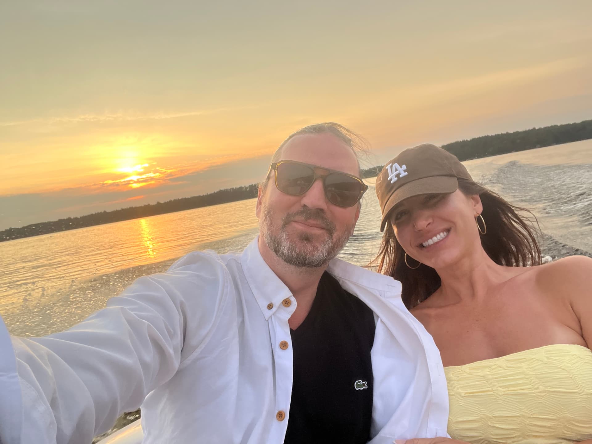 Patrick and Sarah boating at sunset